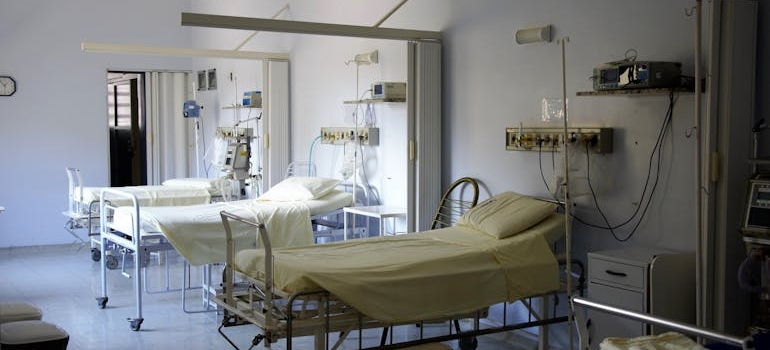 Empty beds in a hospital room.