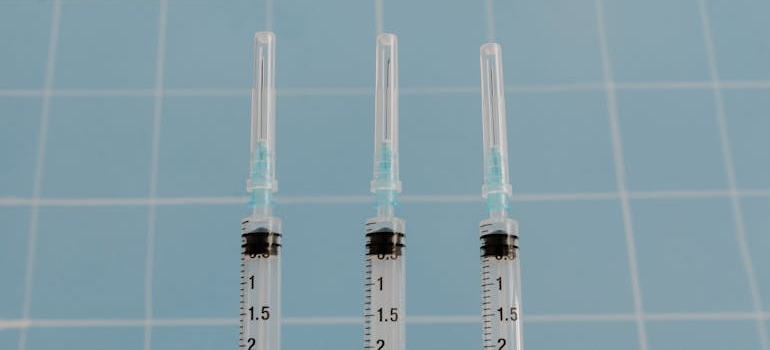 Three clean syringes.