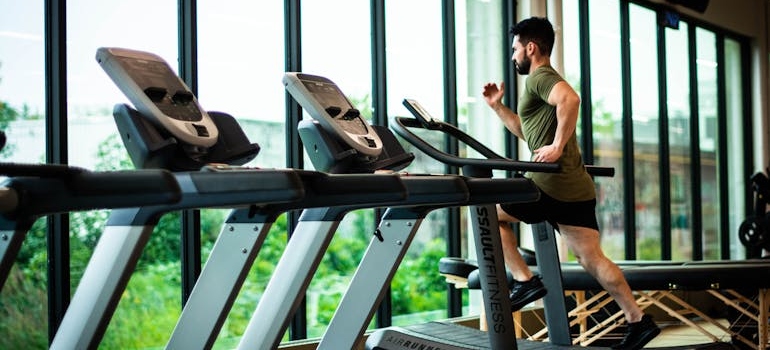Man running on a treadmill.