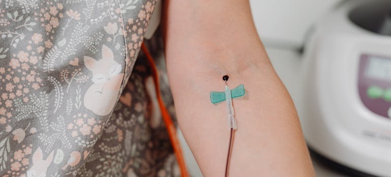 Person getting their blood drawn.