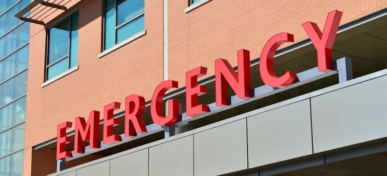 Emergency sign in front of a hospital.