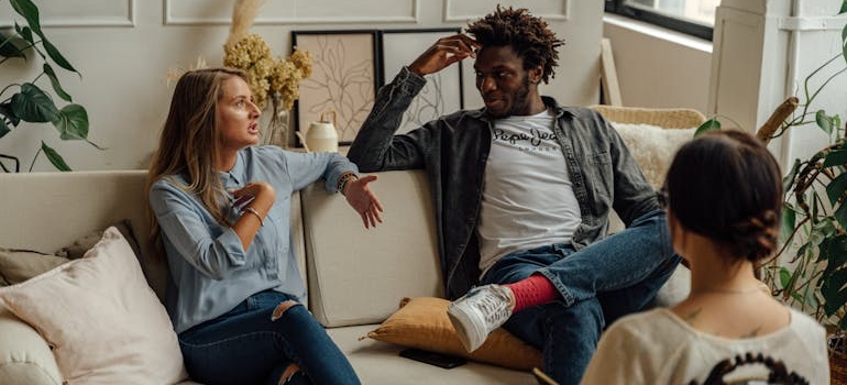 Couple talking about addiction and divorce in therapy.