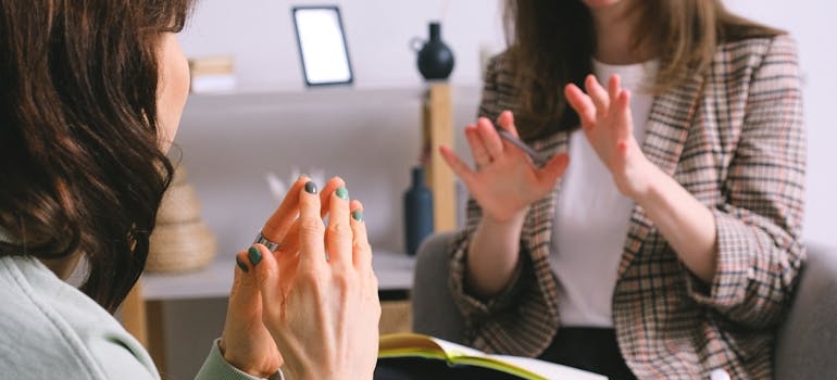 Woman talking to her therapist about transfer addiction.