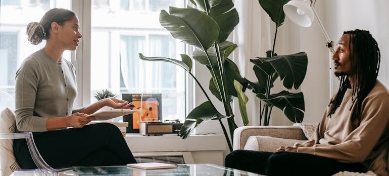 Therapist talking about how to practice mindfulness with her client.