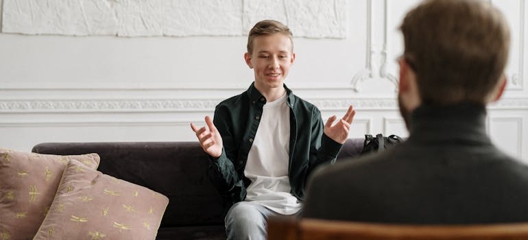 Therapist talking about how to practice mindfulness with his client.