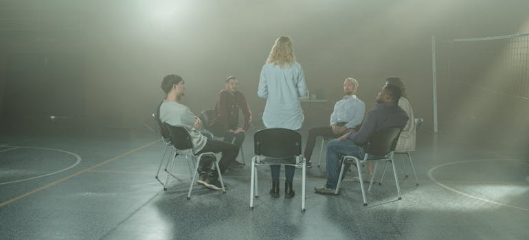 People discussing their issues in a support group.