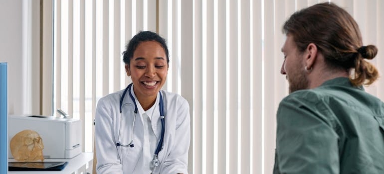 Doctor talking about delirium tremens medications with a patient.