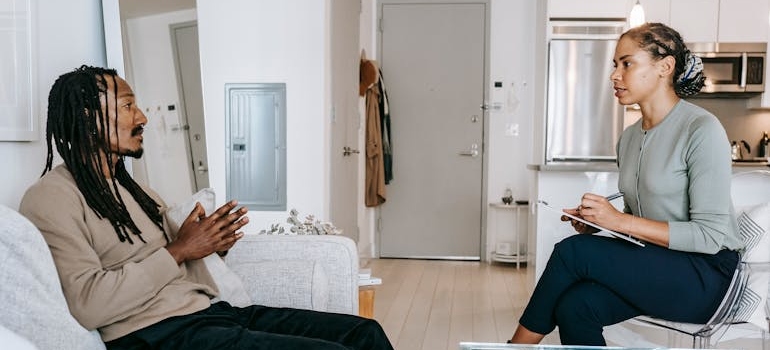 Man talking about the dangers of mixing antidepressants and alcohol with his therapist.