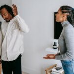 Couple having a big argument in their house.