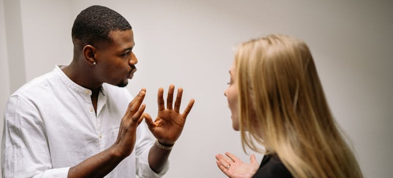 Man trying to calm down his partner.