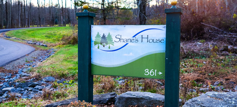 a sign leading to shane's place