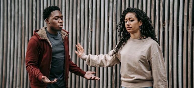 Couple arguing about the signs of codeine addiction.