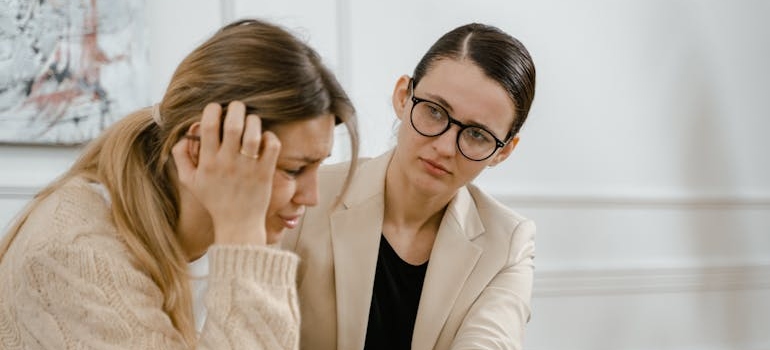 Woman talking about her struggles with OCD and trauma with her therapist.