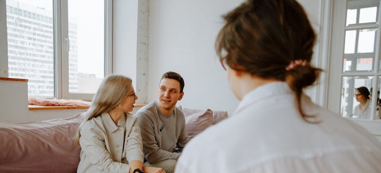 Couple talking to each other in family therapy.
