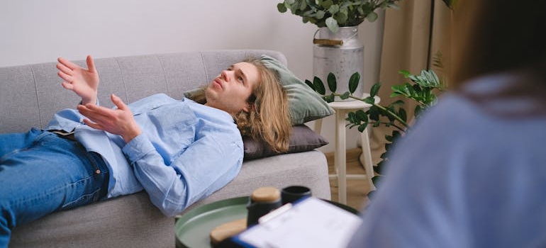 Man talking about his issues with maladaptive coping skills to his therapist.