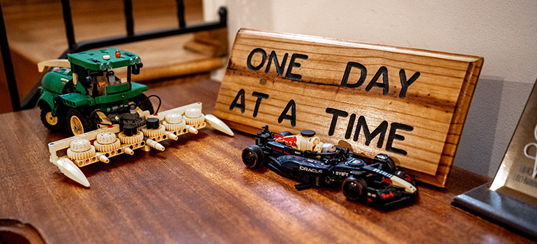 A one day at a time board with toy cars at Drug and Alcohol Rehab Centers in Pennsylvania