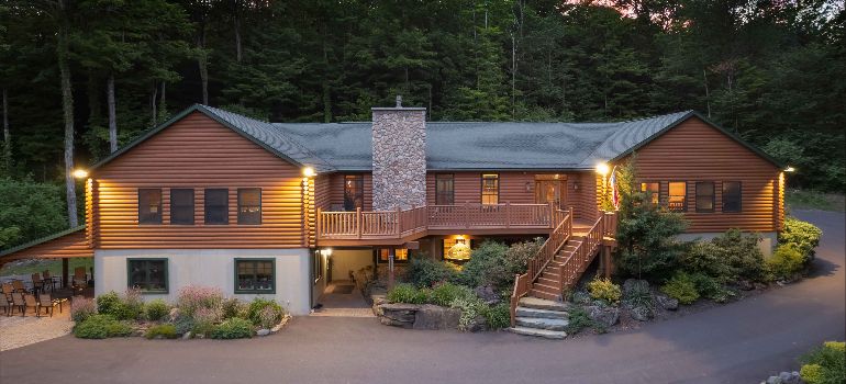 a view of the little creek lodge in sunset