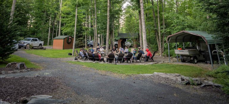 A group therapy in nature with patients sitting in a circle