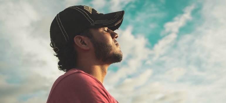 Man practicing deep breathing techniques.