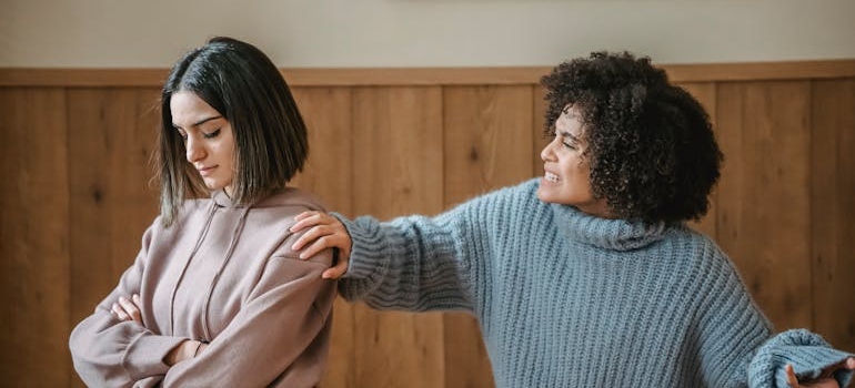 Two friends having a heated argument about alcohol blackouts.