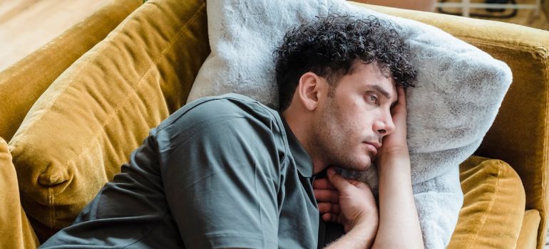 A man not able to sleep due to delaying detox and staying home