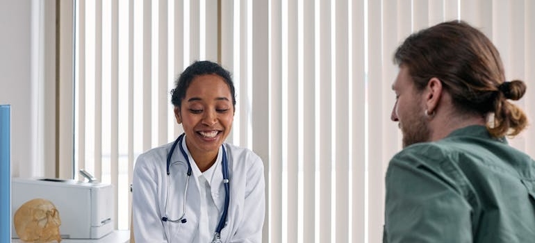Doctor talking about Adderall abuse among college students with a patient.