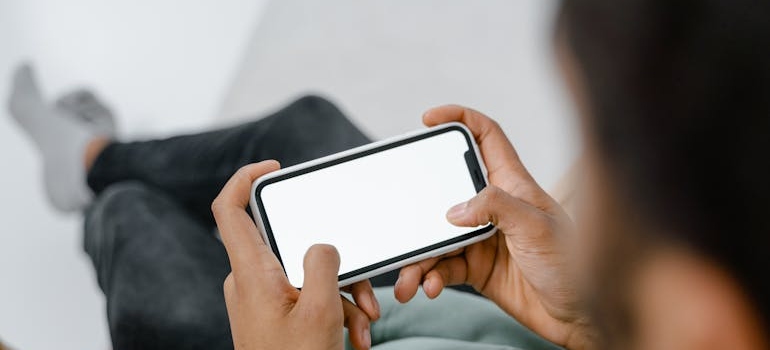 Man holding his phone.