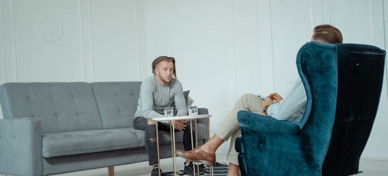 Man and his therapist discussing the alcohol use trends in Pennsylvania.