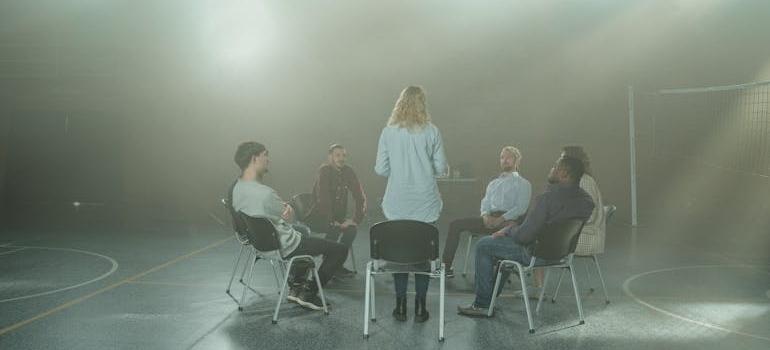 Woman sharing her experience in a support group.