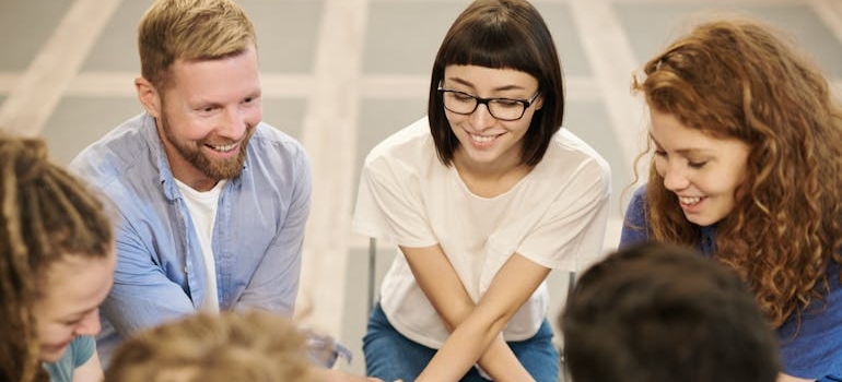 People in a peer support group for Klonopin detox laughing.