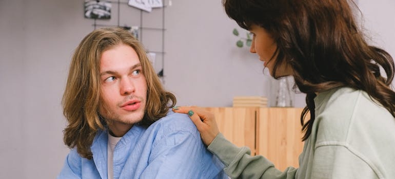 Woman supporting her partner who is going through hitting rock bottom.
