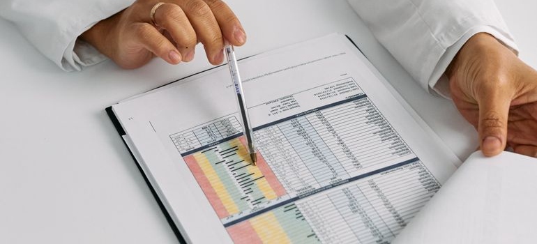 Doctor reviewing the results of random drug testing at work.