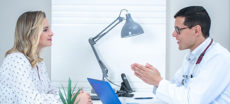 Doctor explaining how to use trazodone for sleep to a patient.