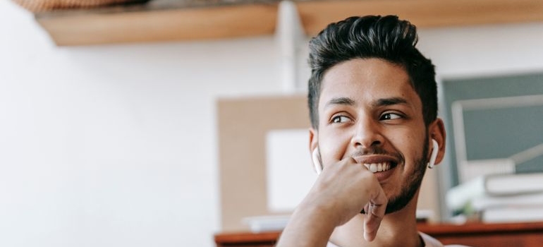 Man smiling and being proud of himself after doing intermittent sobriety.