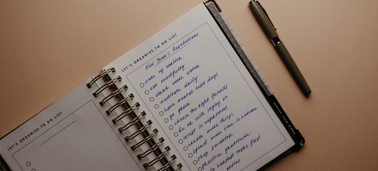 New year's resolutions written in a notebook.